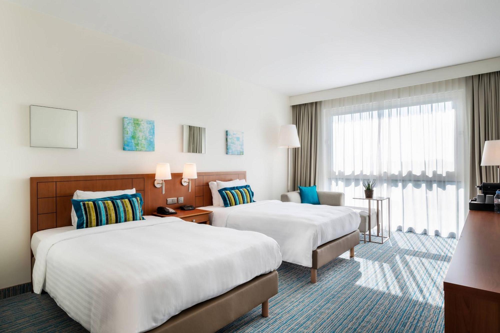คอร์ตยาร์ด บรัสเซลส์ Hotel ดีเชม ภายนอก รูปภาพ